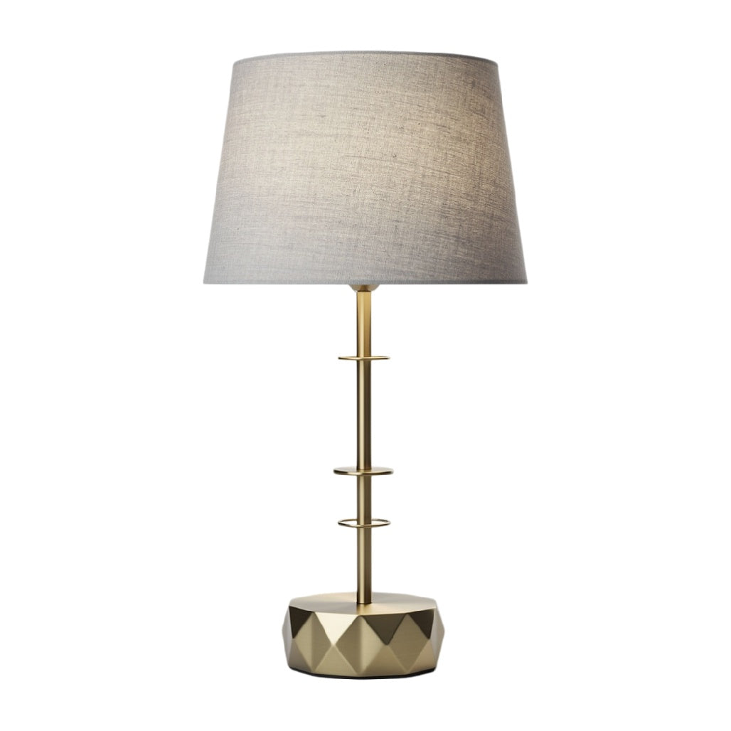 **Lampa stołowa z abażurem z tkaniny i podstawą ze złotym wykończeniem**